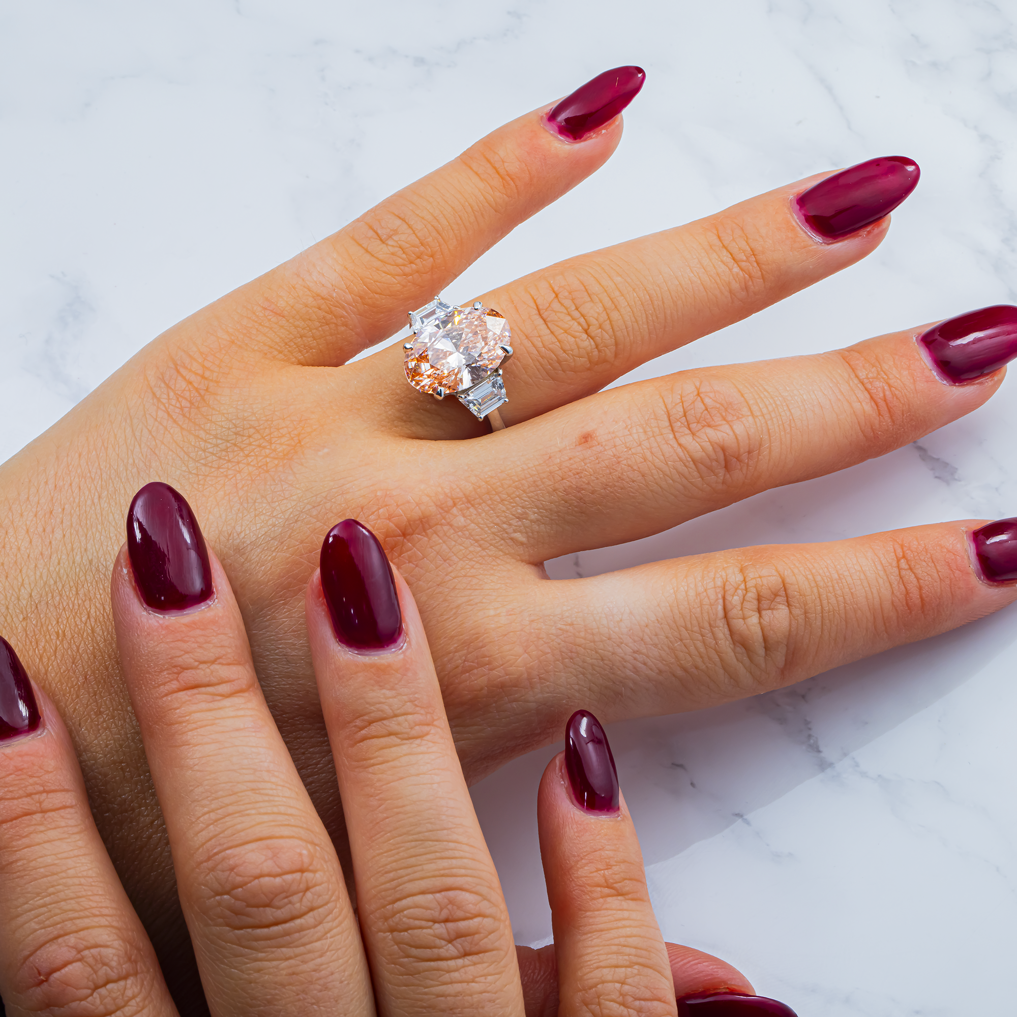 Vivid Pink Oval Lab Grown Diamond Engagement Ring with Trapezoid Side Stones – 6.4 Carats Total, 18K White Gold