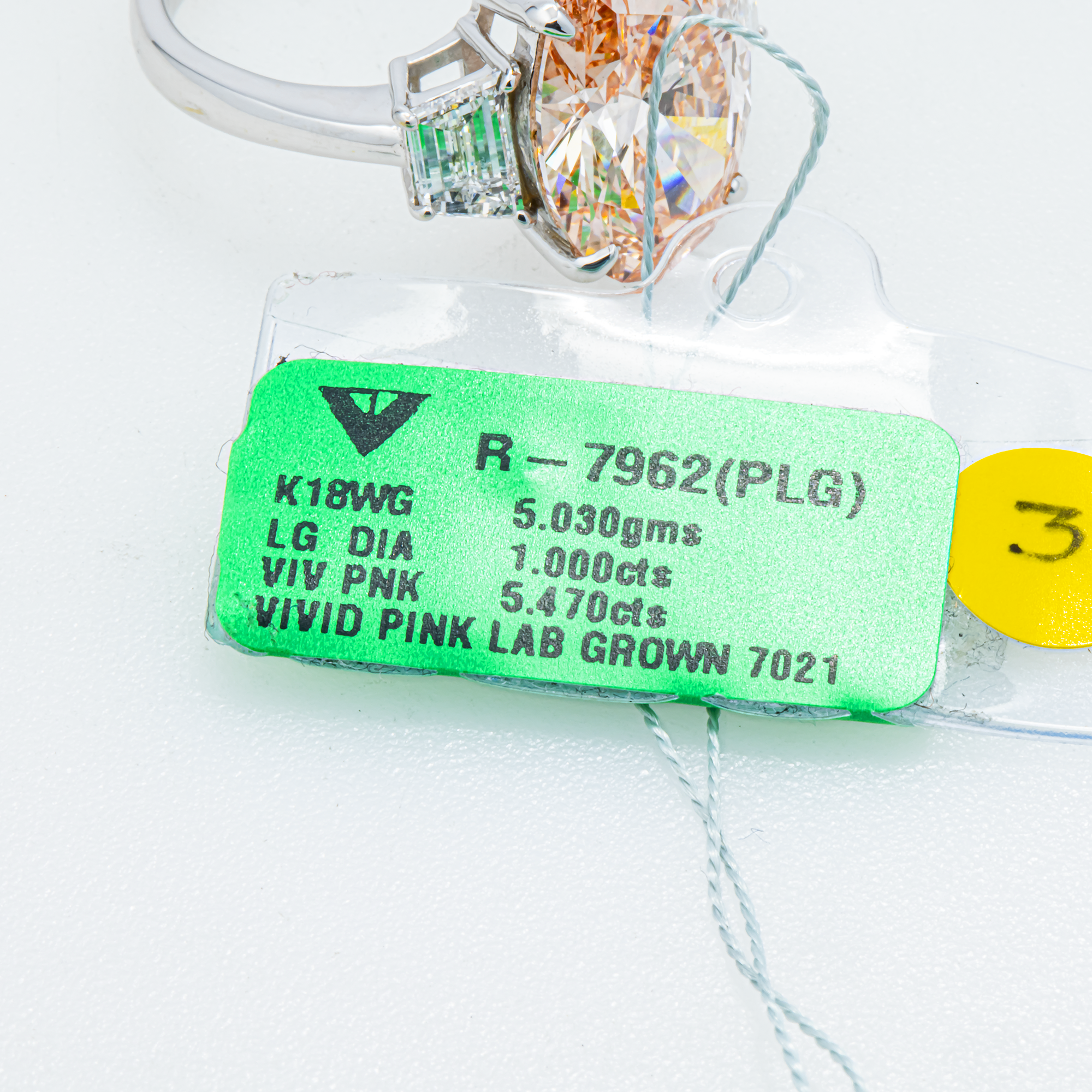 Vivid Pink Oval Lab Grown Diamond Engagement Ring with Trapezoid Side Stones – 6.4 Carats Total, 18K White Gold