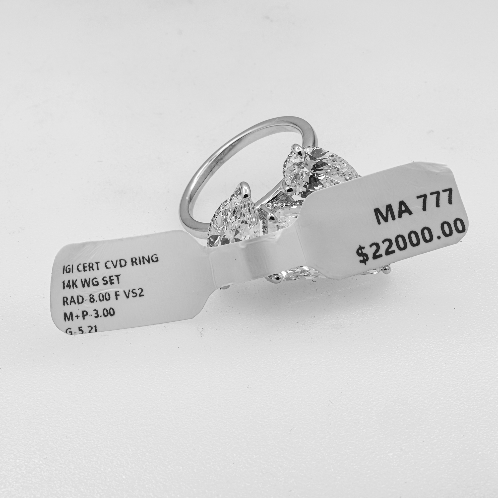 Radiant Cut Lab Diamond Three-Stone Ring with Pear Side Diamonds – 11.21 Carats Total, IGI Certified